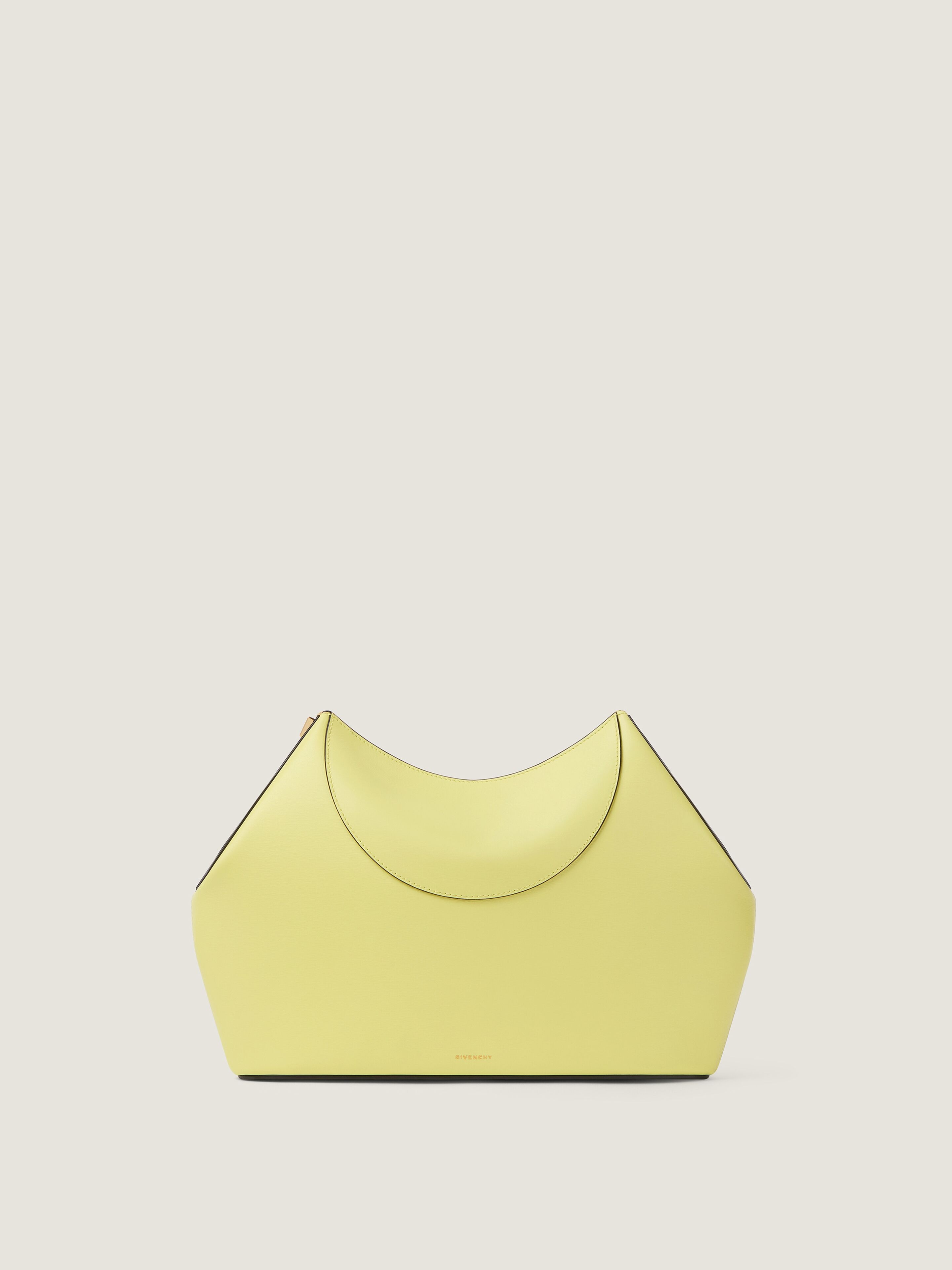 Facet clutch in leather
